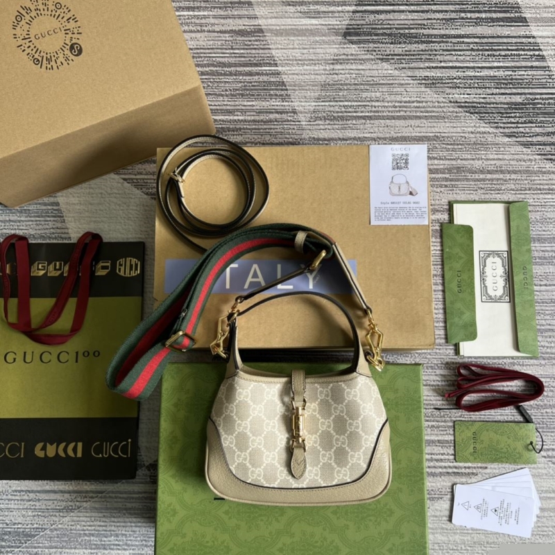 G*u*i top handle bags